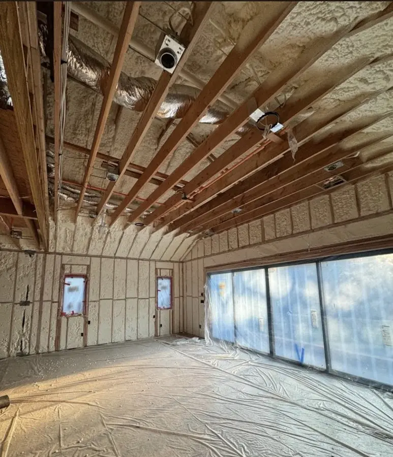 Interior walls and ceiling insulated with spray foam during new construction in Suffield